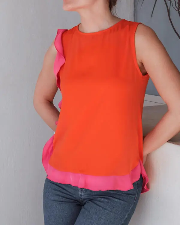Sleeveless Color Block Top with contrasting ruffle details