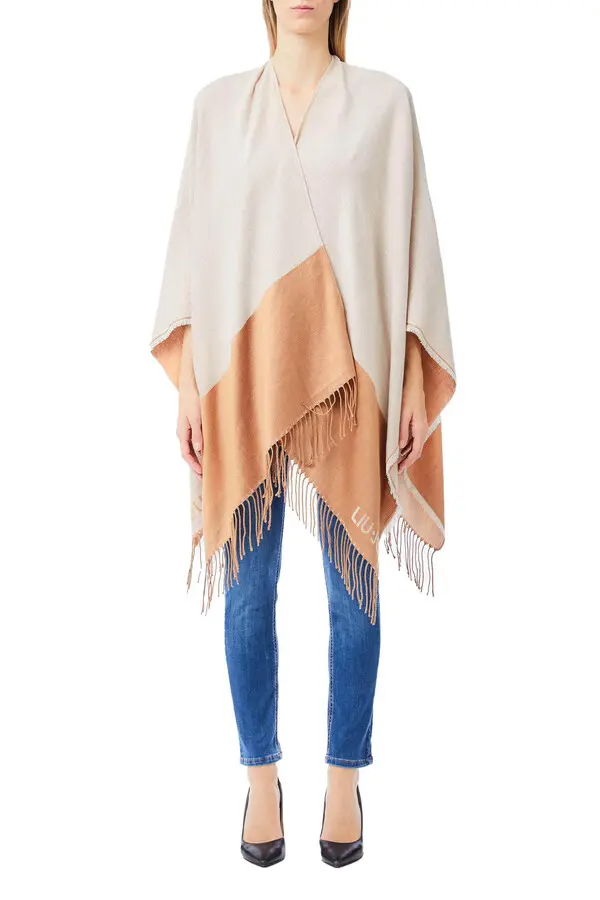 Poncho with logo and fringes Image