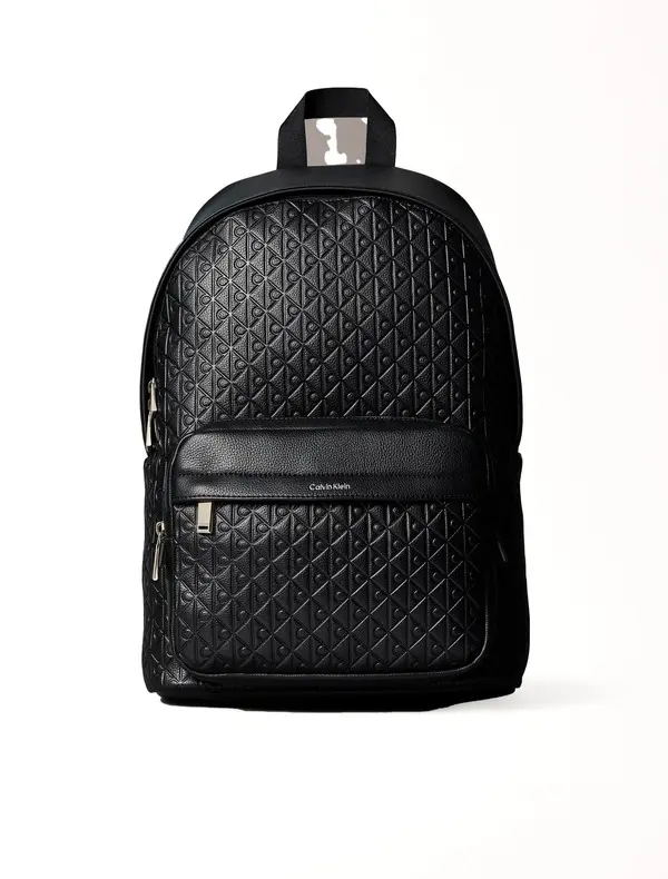 Embossed Allover Monogram Backpack