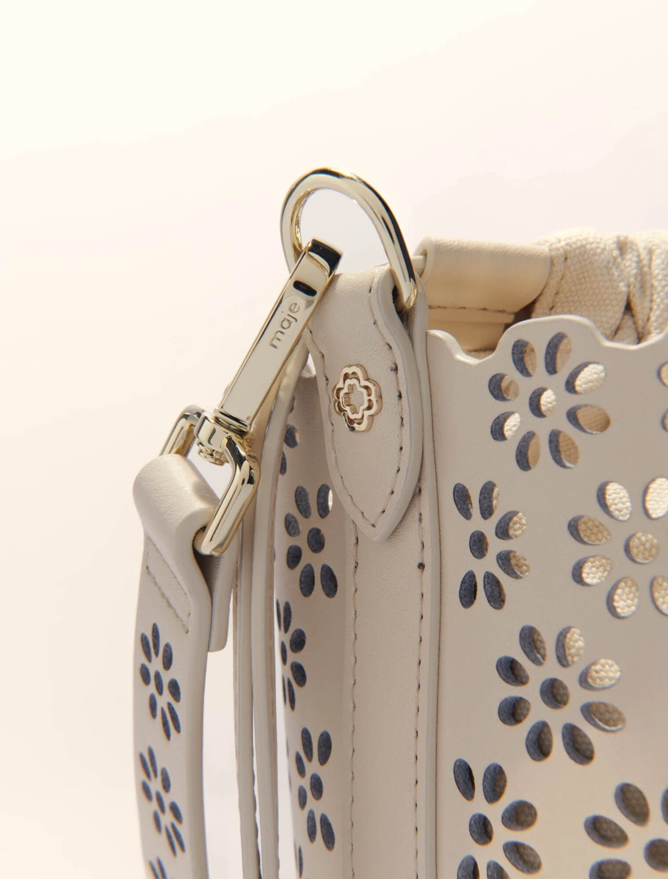 Perforated leather bucket bag Gallery