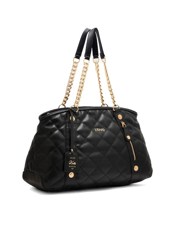 Medium quilted tote bag with charm                      Gallery
