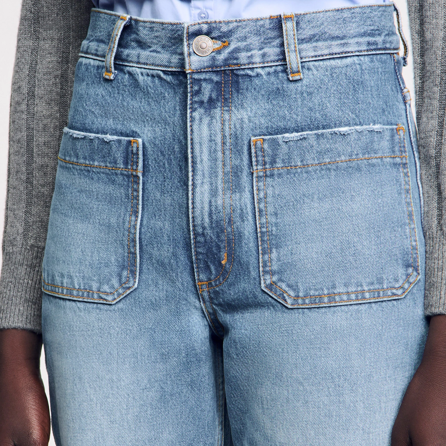 Faded denim jeans with front patch pockets Gallery