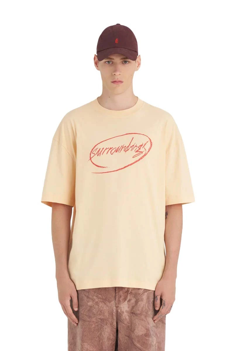 Relaxed Fit T-shirt with "Surroundings" Print - Apricot Gallery
