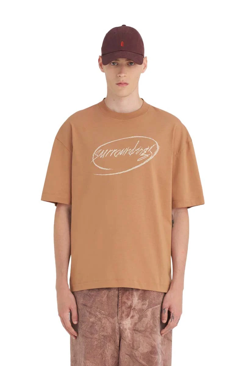 Relaxed Fit T-shirt with "Surroundings" Print - Camel Gallery