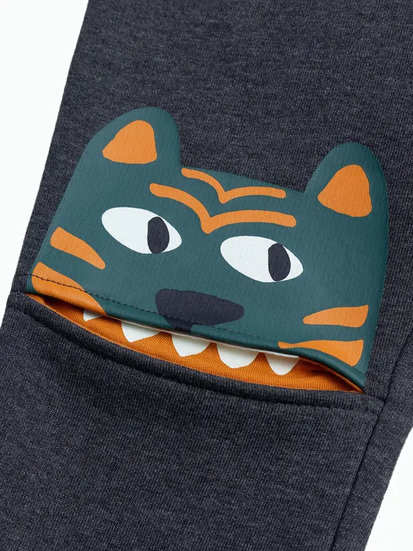 Jogging bottoms with fun designs on the knees 1 Image