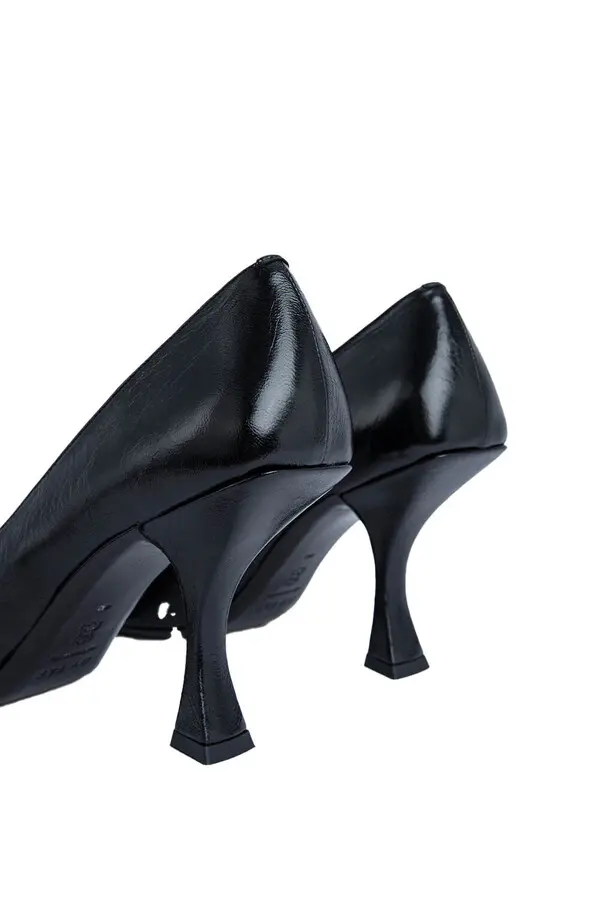 Pointed-toe Pump with Sculptural Flared Heel
 3 Image