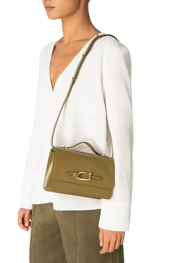 Sleek Minimalist Leather Handbag with Unique Clasp 1 Image