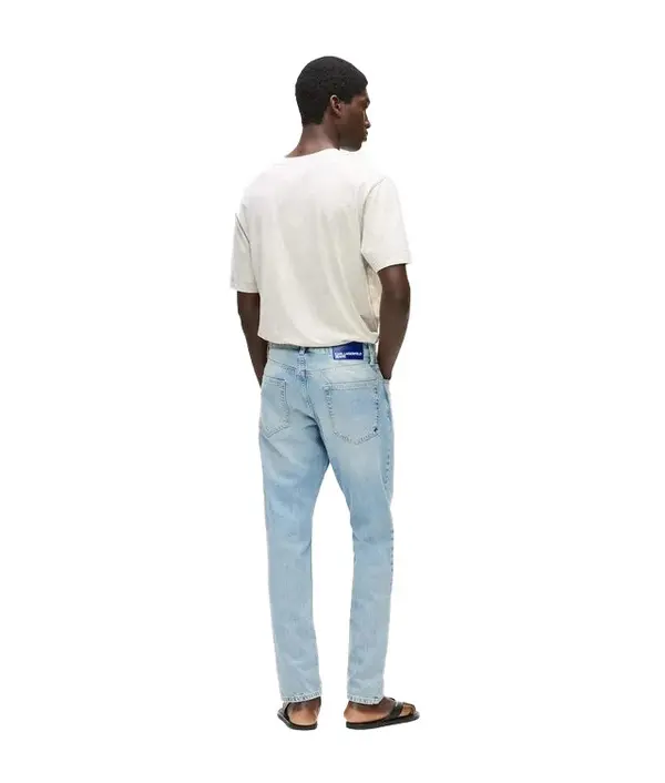Tapered Fit Light Denim Jeans 1 Image