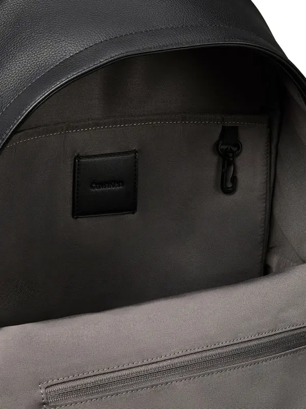 All-OverMonogramEmbossedBackpack 1 Image