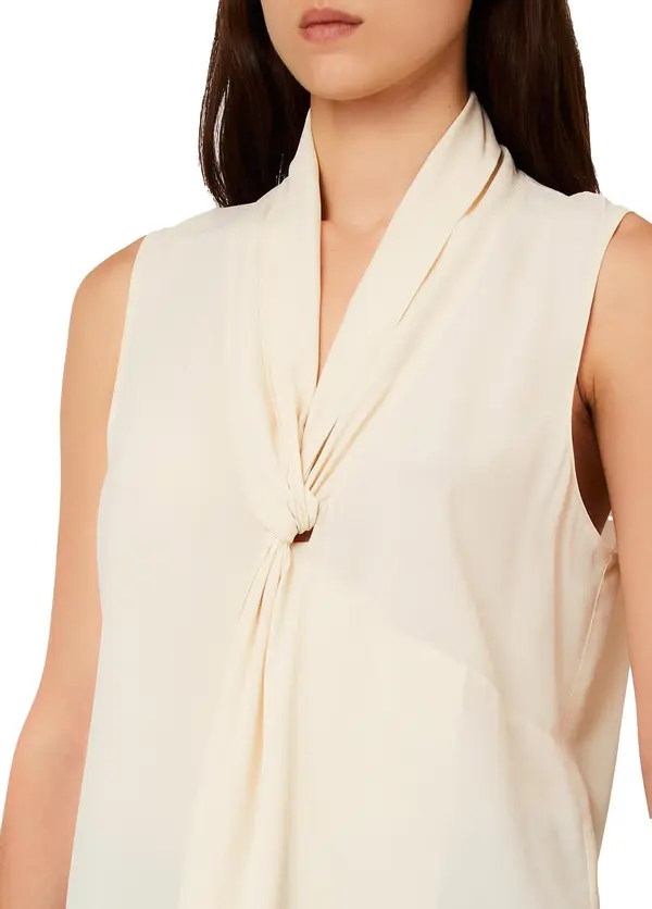 Classic V-neckline Top With An Elegant Tie-front Detail 1 Image